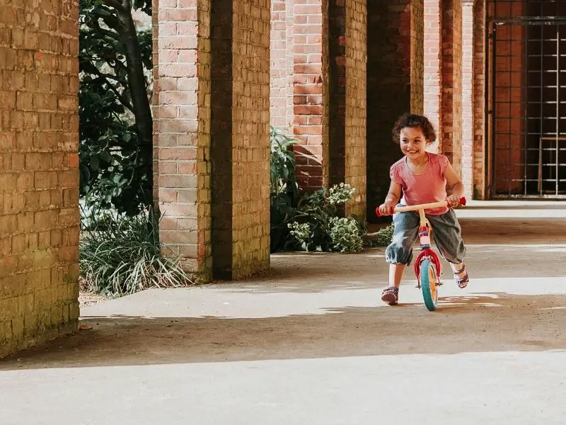 Child on a balance bicycle